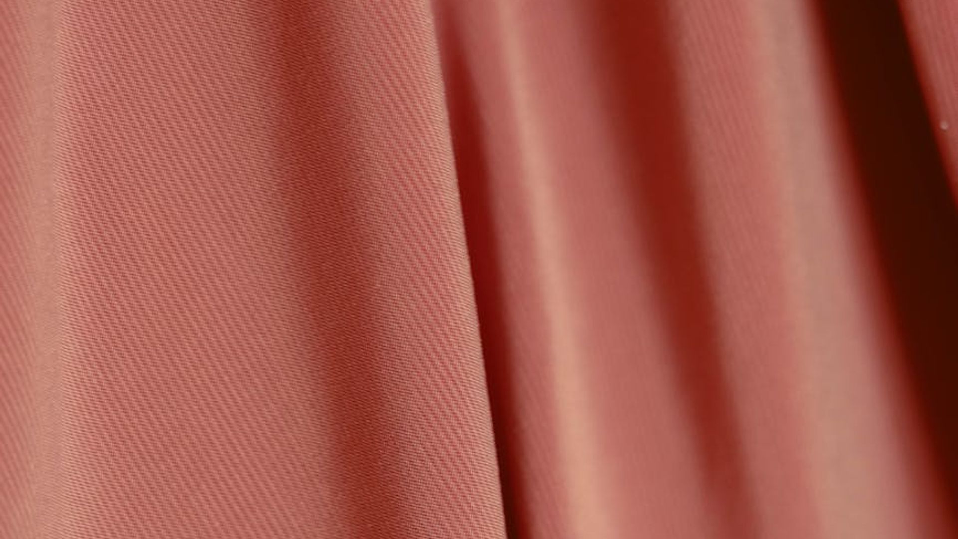 Abstract velvet texture background with subtle sparkles.